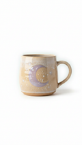 Moonbeam beige hand-glazed pottery mug with celestial design